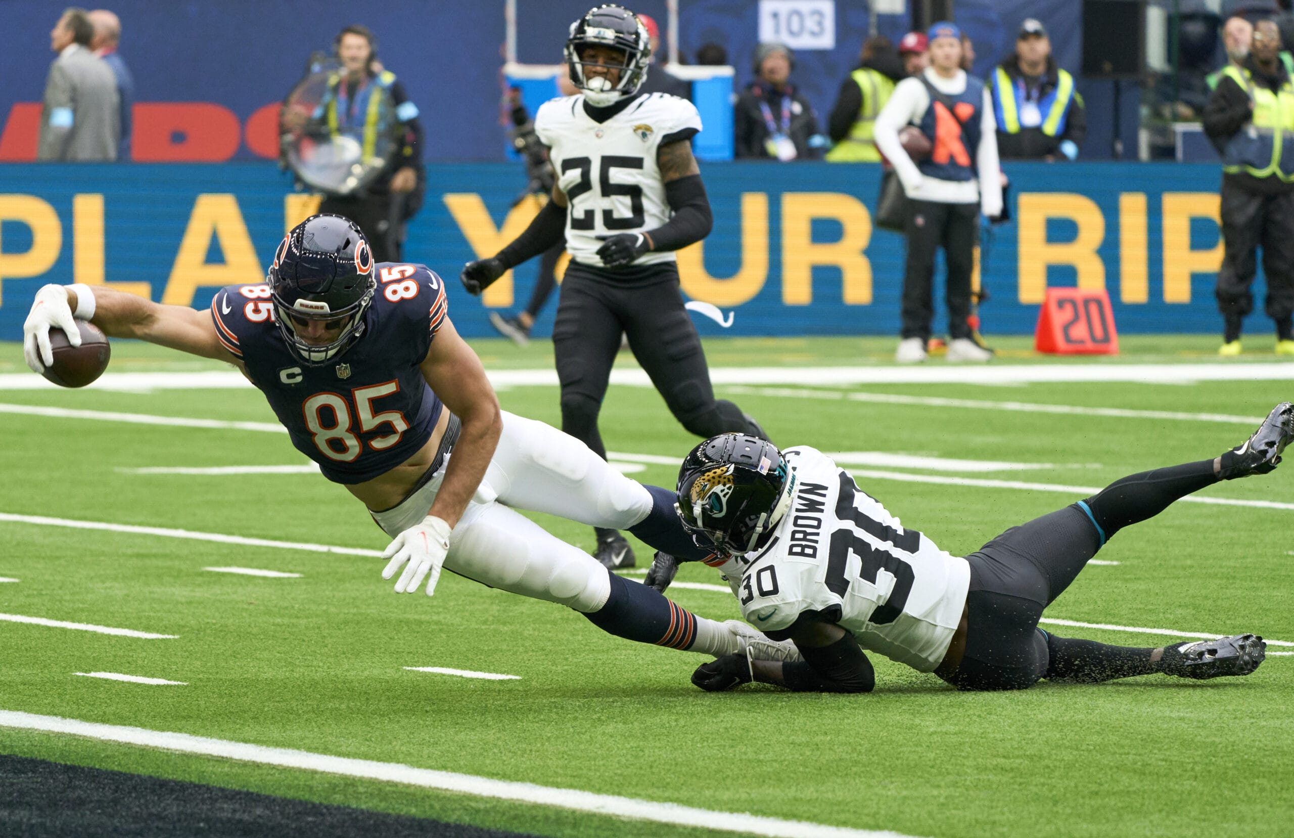 Chicago Bears tight end Cole Kmet reaches for goal line