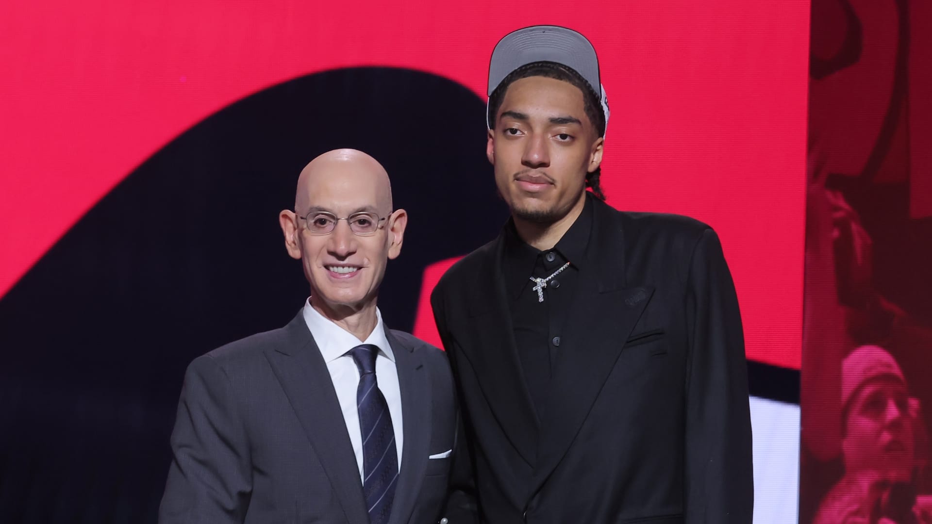 Jun 25, 2025; Brooklyn, NY, USA; Noa Essengue stands with NBA commissioner Adam Silver after being selected as the 12th pick by the Chicago Bulls in the first round of the 2025 NBA Draft at Barclays Center.