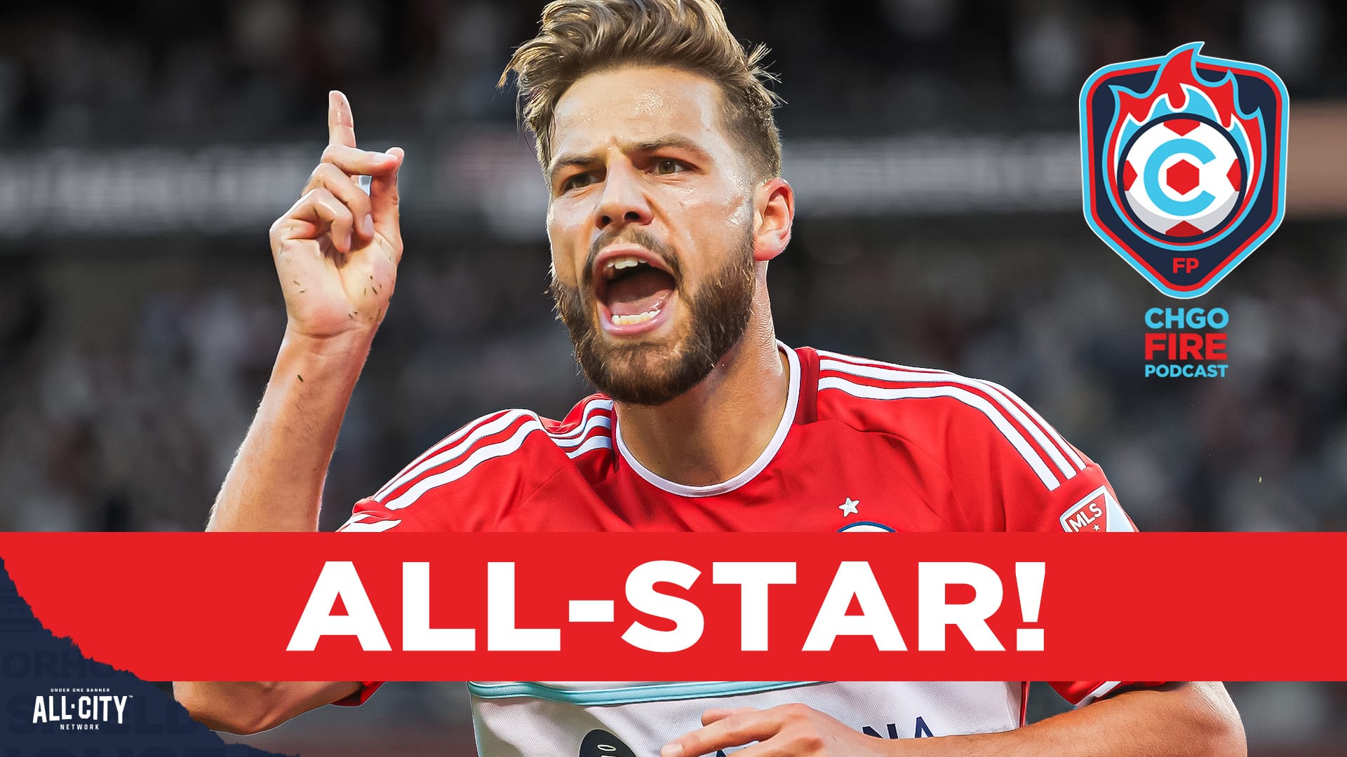 Chicago Fire forward Philip Zinckernagel celebrates a goal by pointing to the sky while running.
